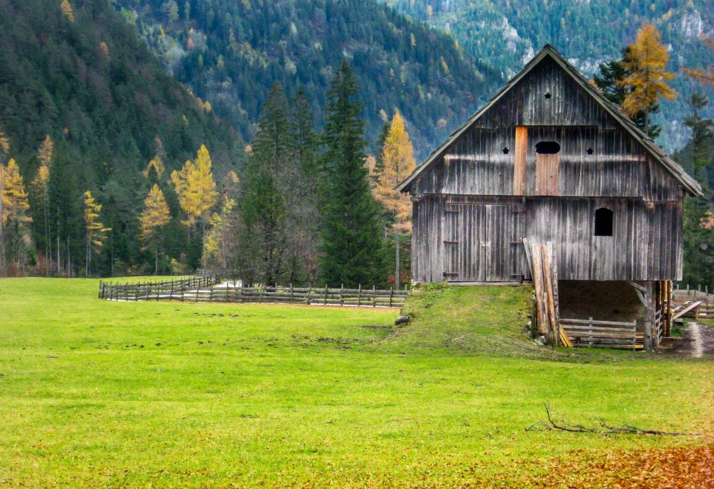 An old wooden barn in the Robanov Kot valley and landscape park in northern Slovenia