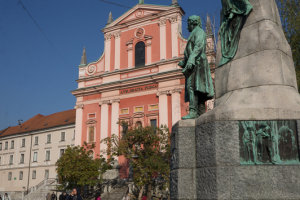 Ljubljana Preseren monument with the distinctive pink Franciscan Church in the background