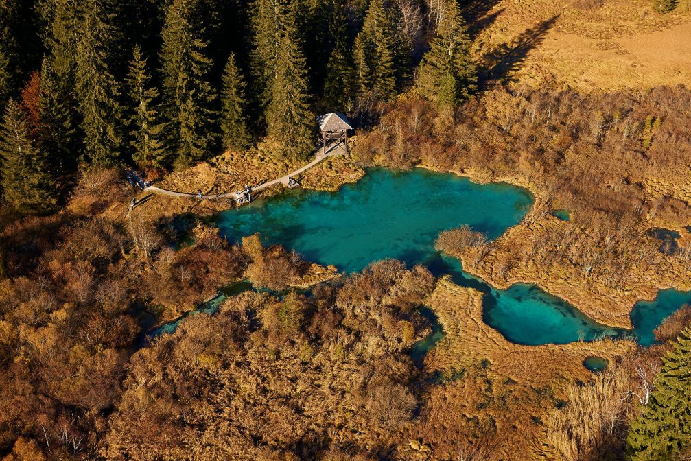 An aerial view of the Zelenci lake and nature reserve in northwestern Slovenia