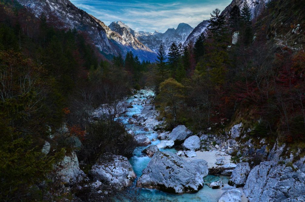 The Soca River in the Trenta Valley with the Julian Alps in the background