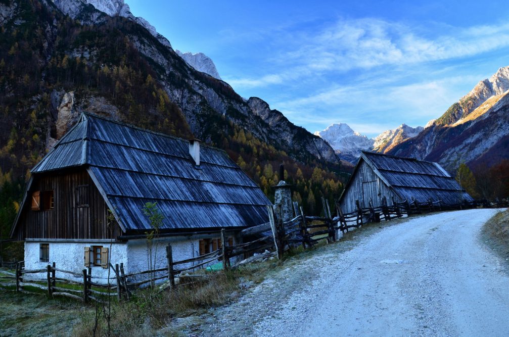 A dirt road leading next to the farmsteadt in in the Trenta Valley in Slovenia