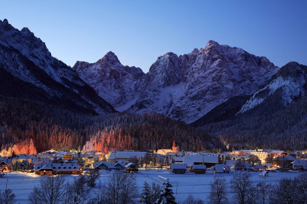 Kranjska Gora covered with a thick layer of snow at night in the winter time