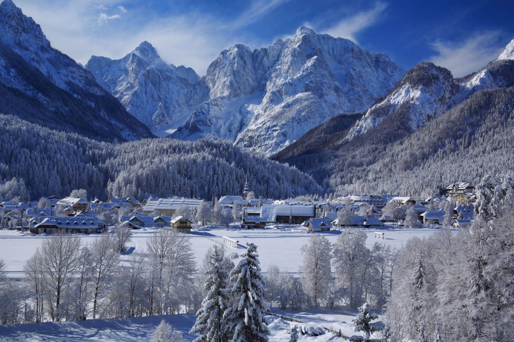 The alpine village of Kranjska Gora in northwestern Slovenia covered with a thick layer of fresh snow in the winter