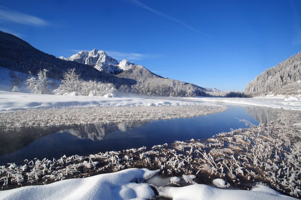 The Sava Dolinka river flowing through the Upper Sava Valley in the winter time