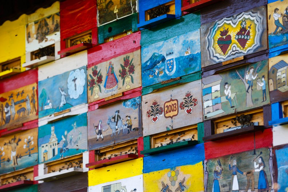Painted beehive panels which are typical of Slovenia