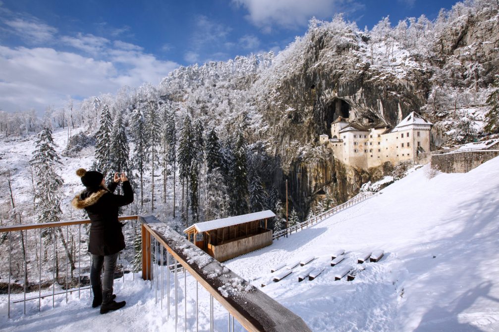 Predjama Castle in the winter time with a layer of fresh snow