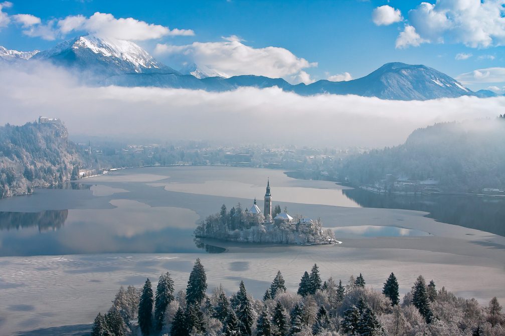 Elevated view of partially frozen Lake Bled in the winter