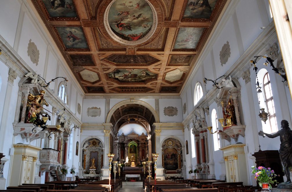 The ornate interior of the Church of St. George in Piran, Slovenia