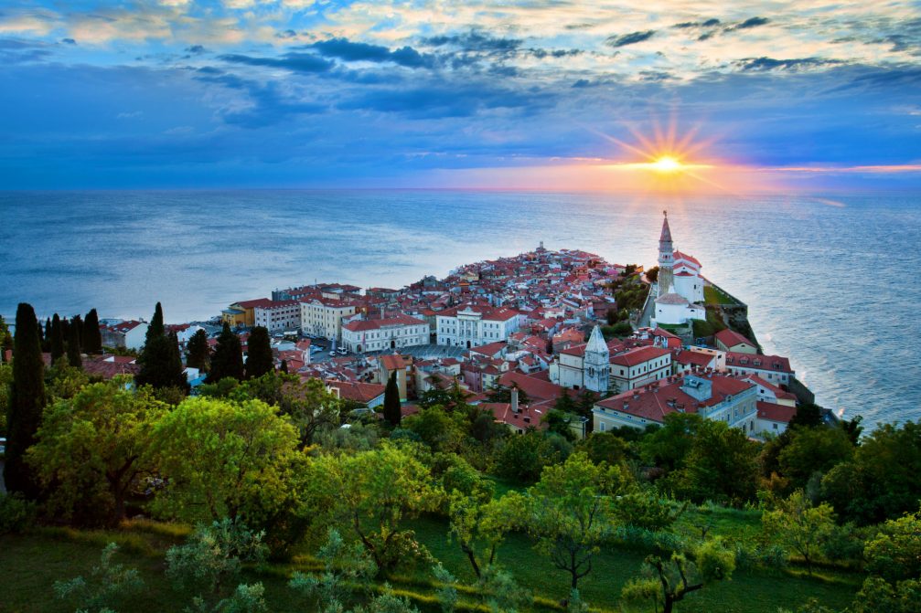 Elevated view of the coastal town of Piran in Slovenia at sunset