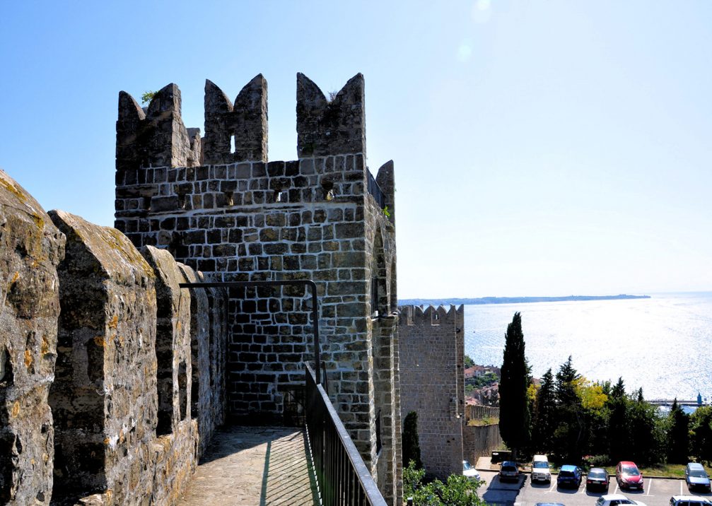 View of Town Walls and its tower in the coastal town of Piran in Slovenia