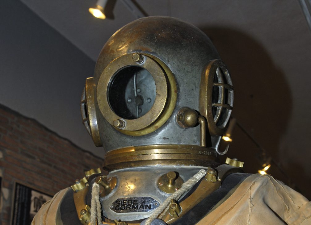 A 12-bolt copper and brass diving helmet by Siebe Gorman on display at the Museum Of Underwater Activities Piran