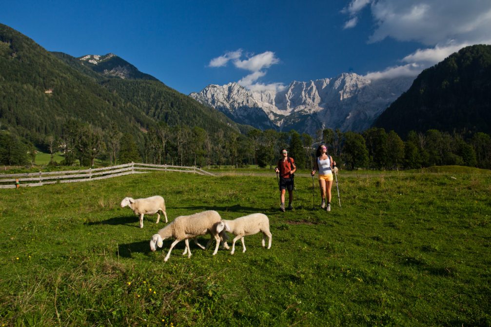 A young couple hiking in the Jezersko Valley in northern Slovenia