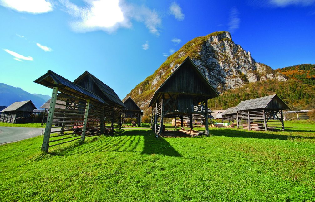 A traditional double height toplar hayracks in the village of Studor in Bohinj