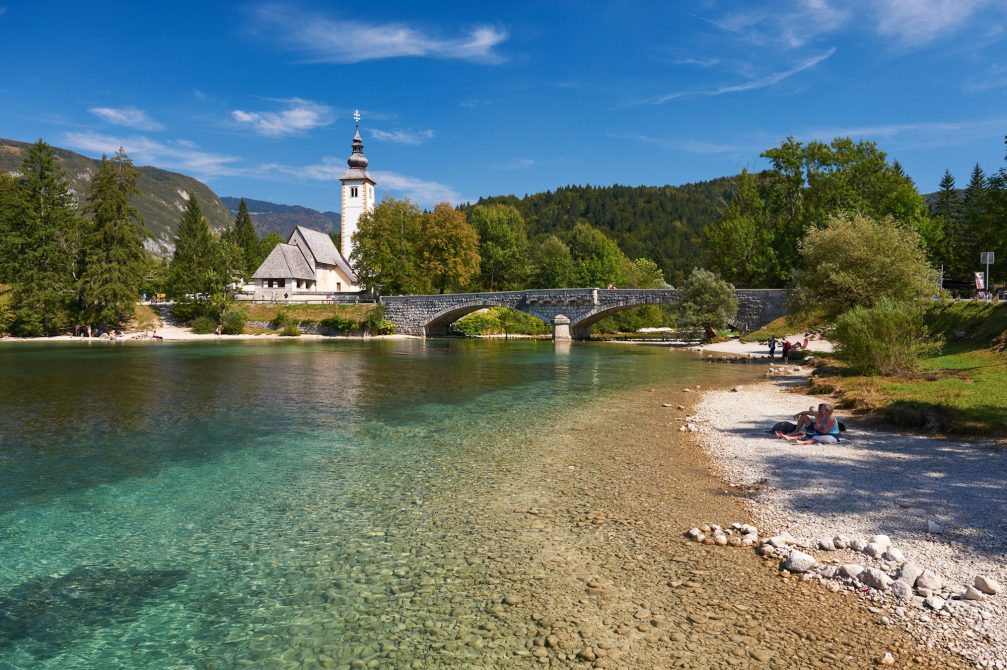 St. John the Baptist Church right by the stone bridge on the east end of Lake Bohinj