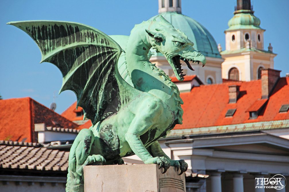 Dragon statue of sheet copper on the Dragon Bridge in Ljubljana, the capital of Slovenia