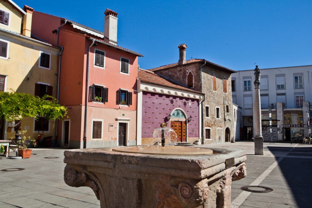 Carpaccio Square in the Old Town in Koper with the Column of St. Justine and the capital shaped well