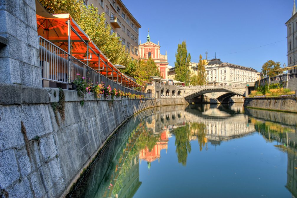 Ljubljanica river flowing through the city centre of Slovenia's capital Ljubljana in autumn
