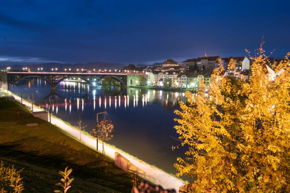 A view of the city of Maribor at night in autumn