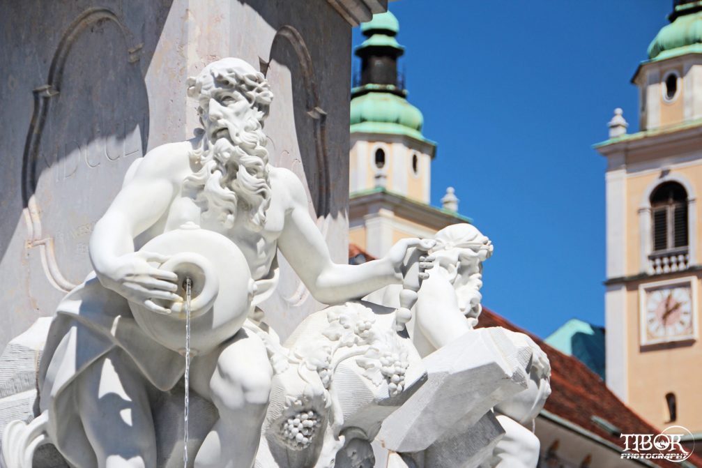 Robba Fountain, an 18th-century fountain in Ljubljana with an obelisk, pool and 3 sculpted figures holding jugs