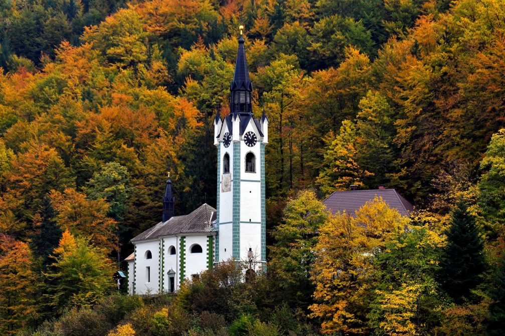 Exterior of the Subsidiary church of the Mother of God in Kropa, Slovenia in autumn