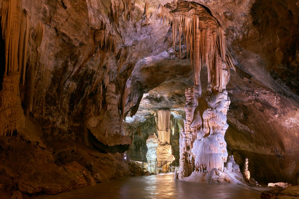 Stalactites and stalagmites inside the Postojna Cave in Slovenia