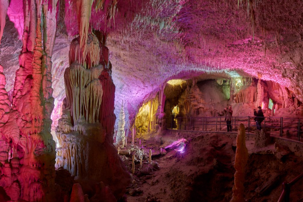 Postojna Cave in pink shades during Living Nativity Scenes in the Christmas time