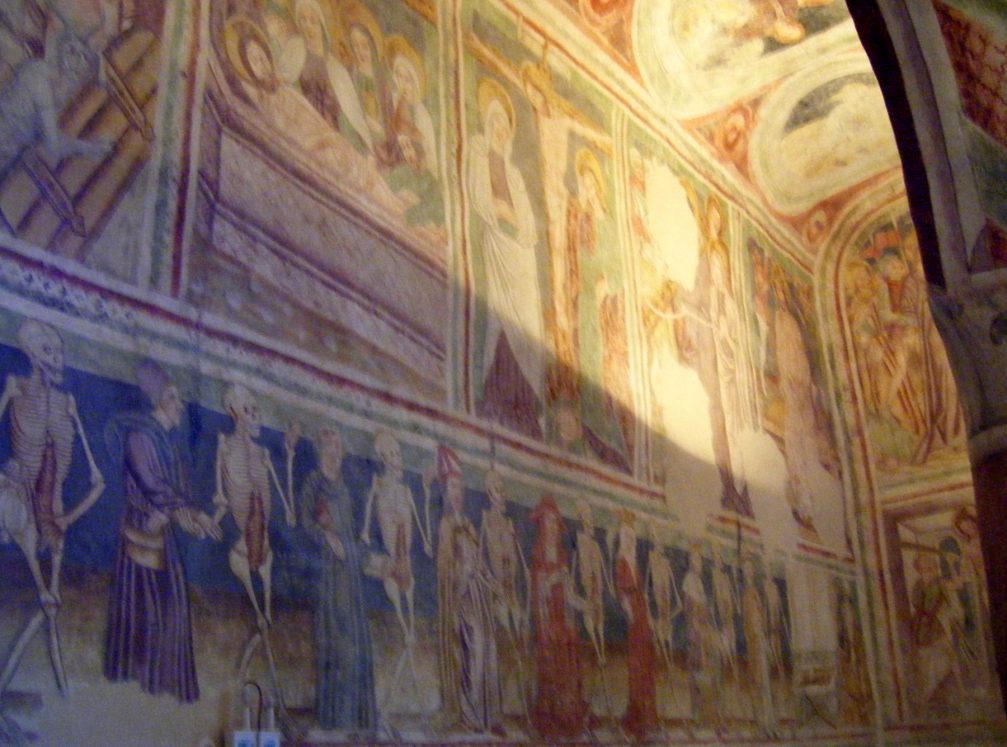 The interior of the Holy Trinity Church in Hrastovlje adorned with frescoes