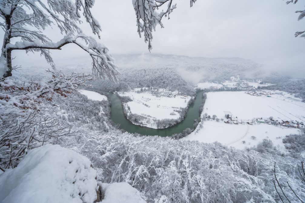 Elevated view of the Kolpa river from the Sodevci cliffs in winter