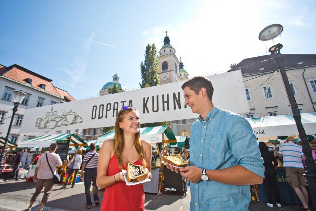 A couple eating Potica in Ljubljana, the capital of Slovenia