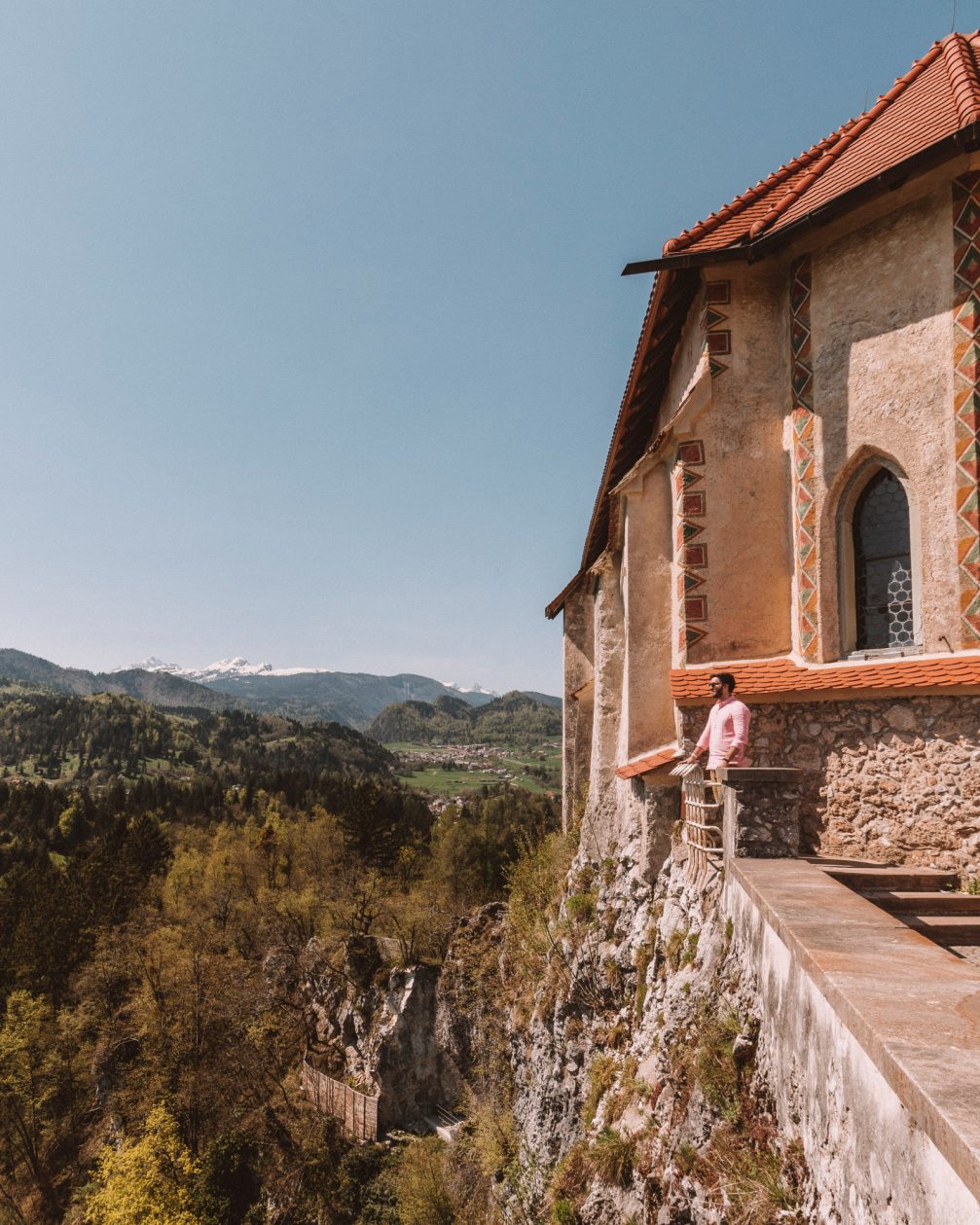 A traveller enjoying a view from the Bled Castle in Slovenia