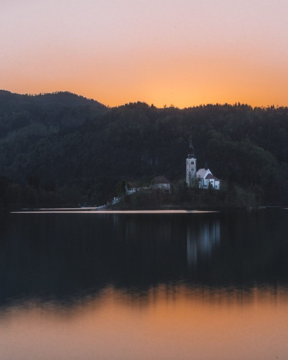 A calm and peaceful Bled Island at sunset