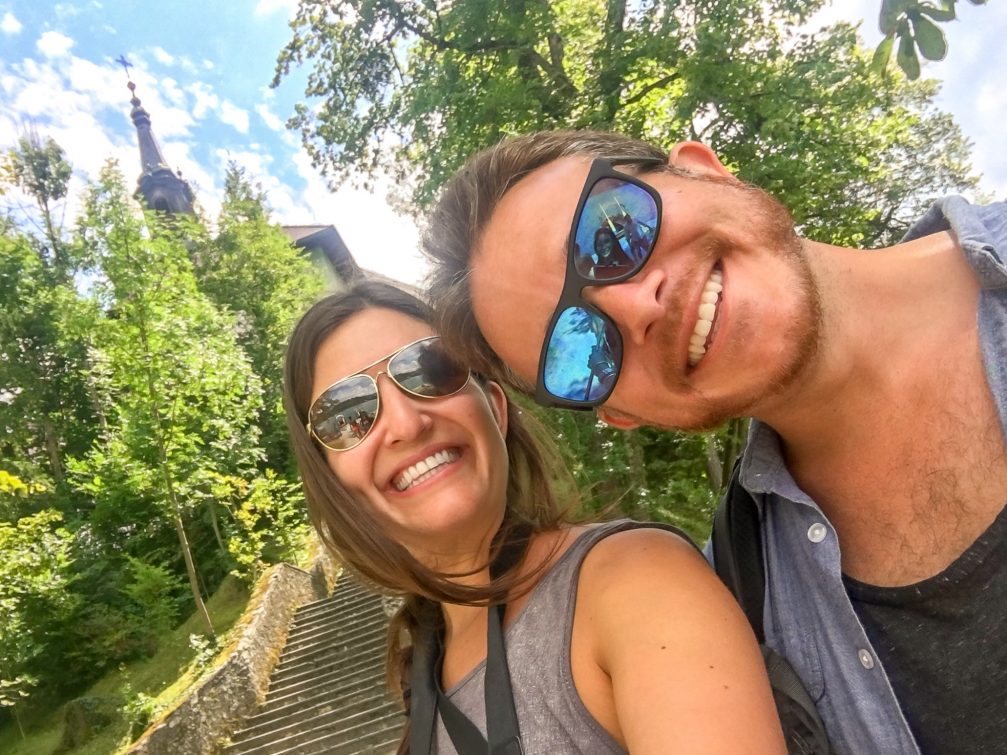 Travel bloggers Danielle Hyman And Adam Aronson Of travelhelix on Bled Island in Slovenia