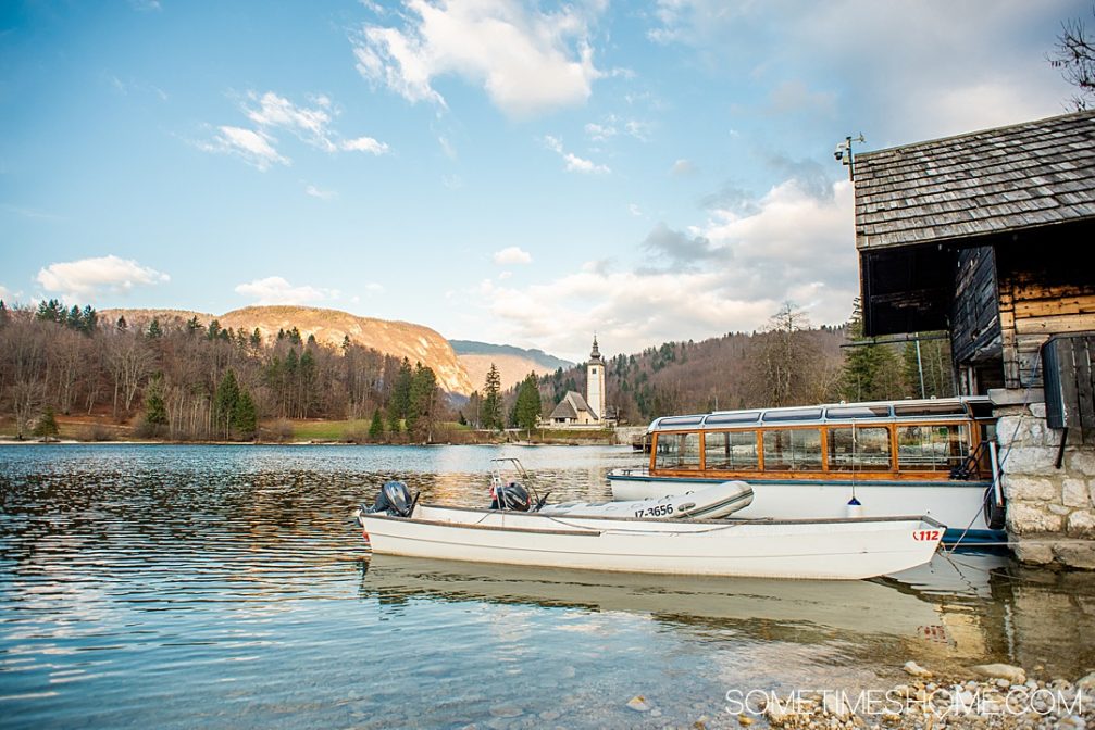 Lake Bohinj with the Church of St. John the Baptist and the stone bridge in the background