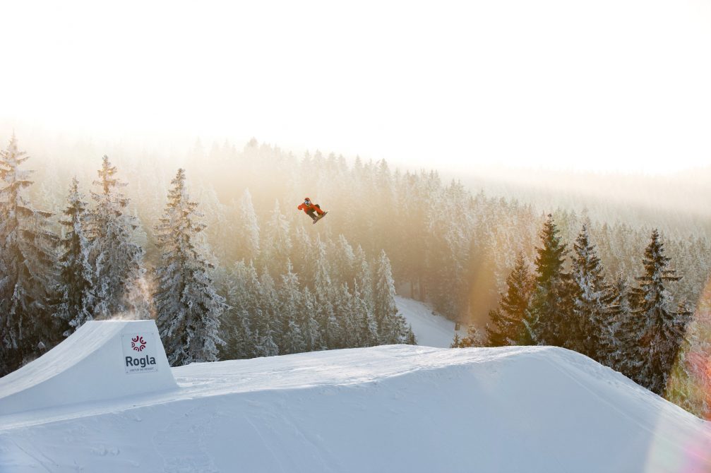 A snowboarder at the fun park at Rogla Ski Resort