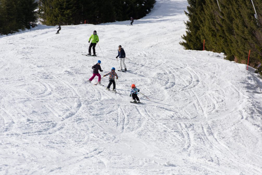 A group of beginner skill level skiers at Rogla Ski Resort in Slovenia