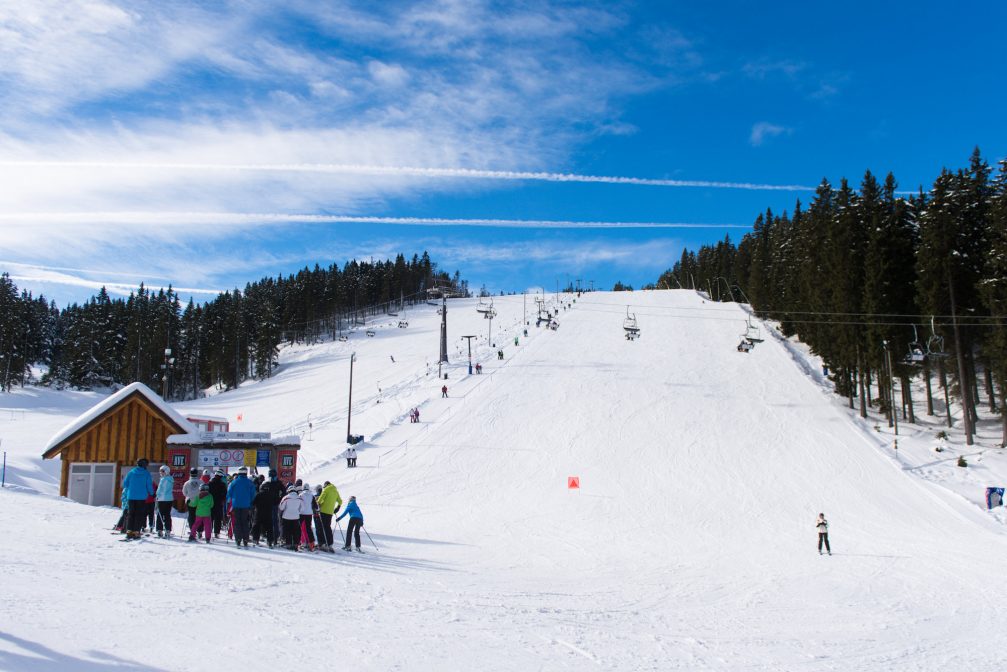 Rogla Ski Resort on a sunny winter day with clear blue sky