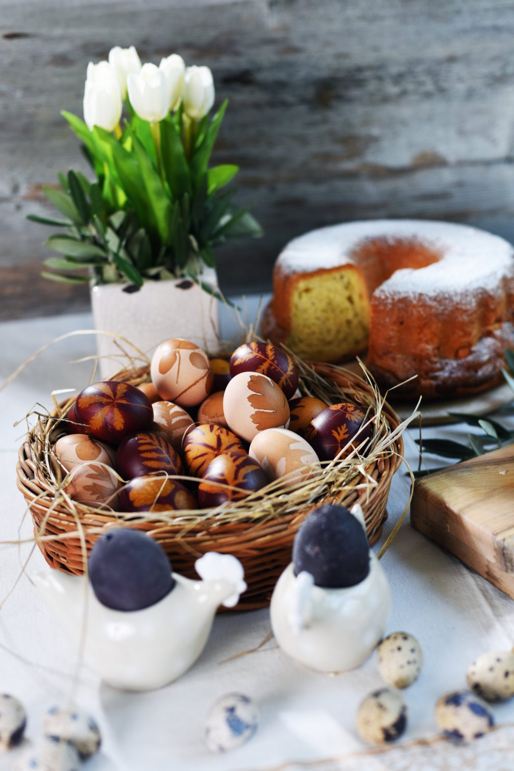 Traditional Slovenian Easter Breakfast with potica, a Slovenian festive sweetbread and Easter eggs