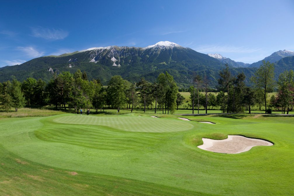 Kings Course at Royal Bled Golf with snow capped mountains in the background