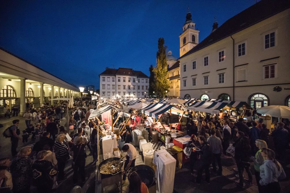 Open Kitchen food market at Pogacar Square in Ljubljana at night