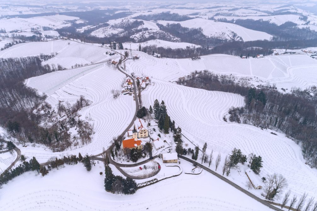 Slovenian hilltop village of Jeruzalem covered with snow in winter