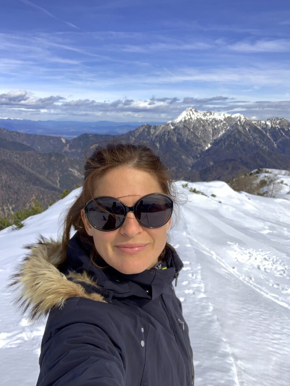 Jerneja Fidler Pompe selfshot with Mt. Dovska Baba in the background