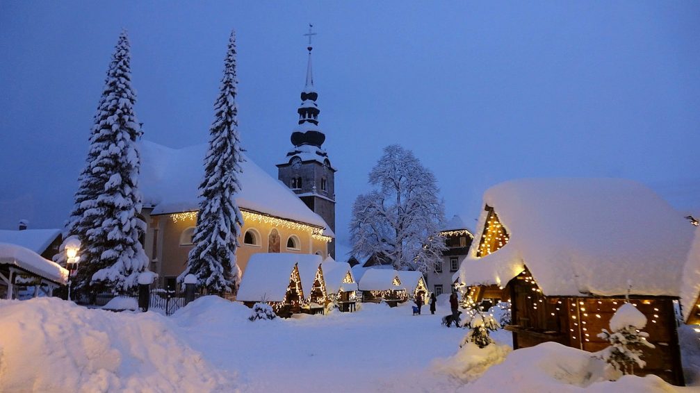 Village of Kranjska Gora in Slovenia during heavy snowfall in winter