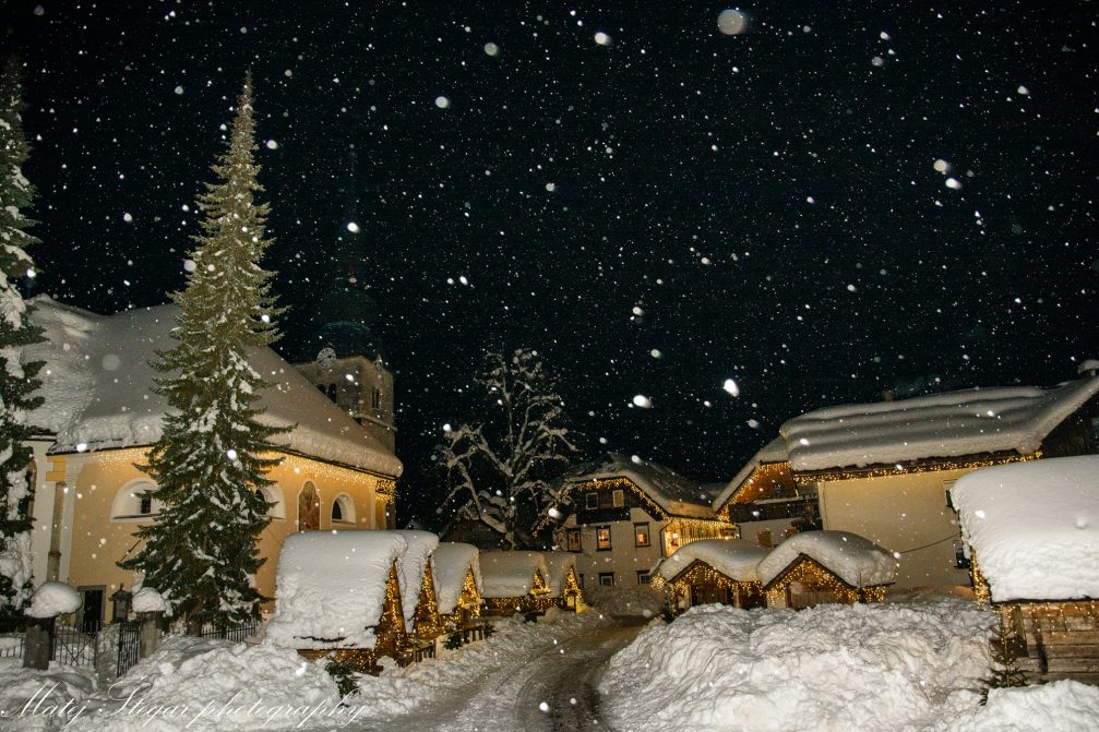 Snowing in Kranjska Gora in Slovenia at night in the winter