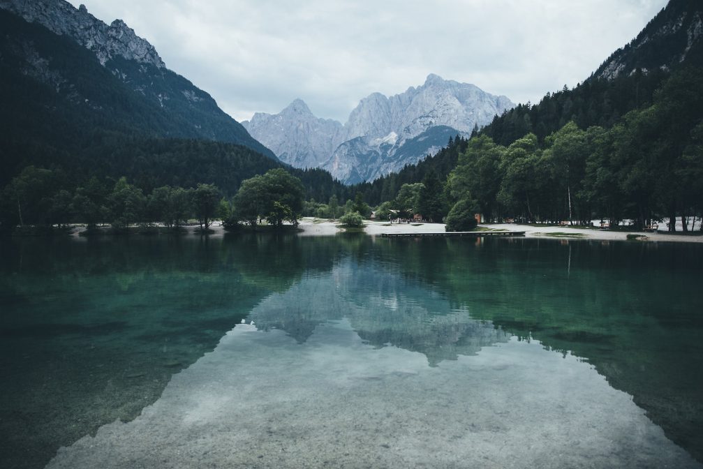 Lake Jasna looks tranquil and calm on a dull day in the summer