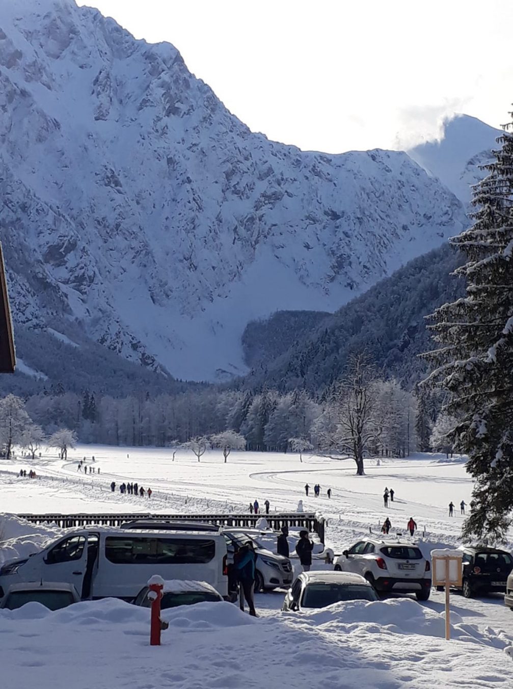 Local people visiting Logarska Valley in Slovenia covered in snow in winter