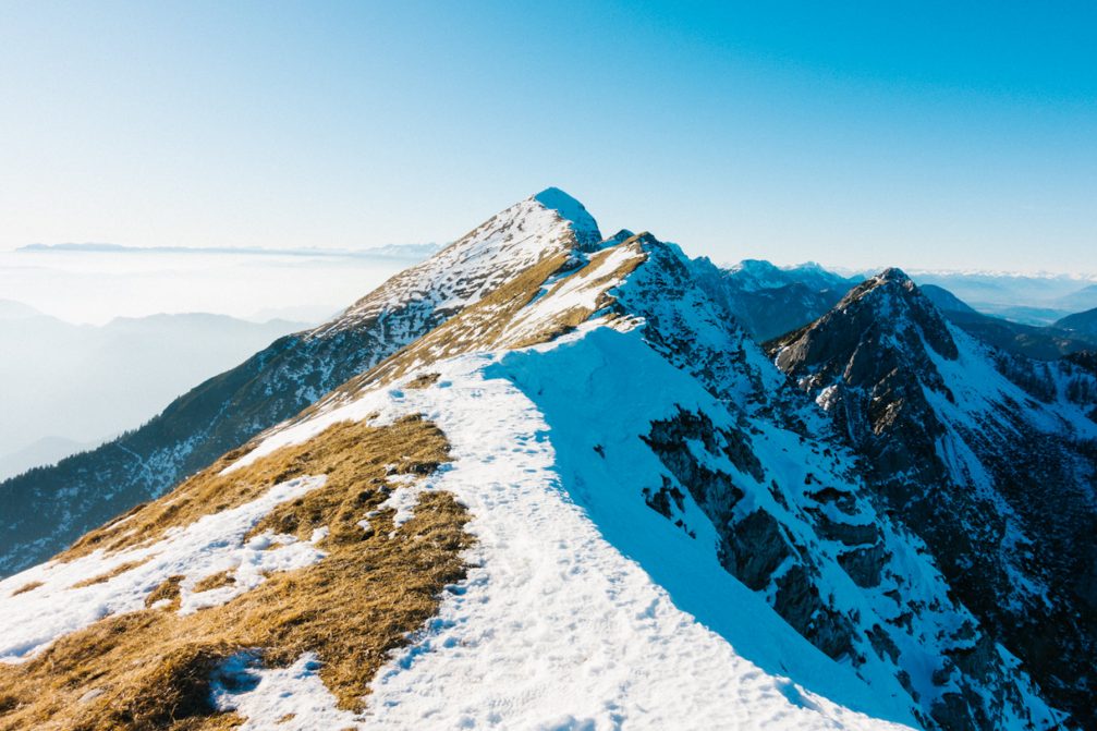 At the top of Mt. Kofce in Karavanke Mountains in winter