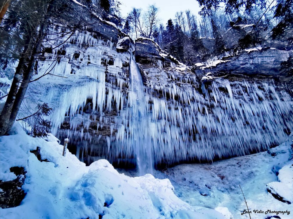 Pericnik Waterfall in winter after snowfall and freezing temperatures