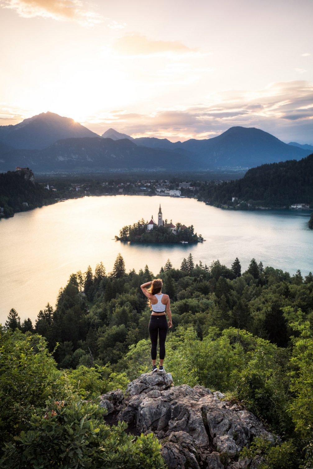 View of Bled Island in the middle of Lake Bled at sunrise in the summer