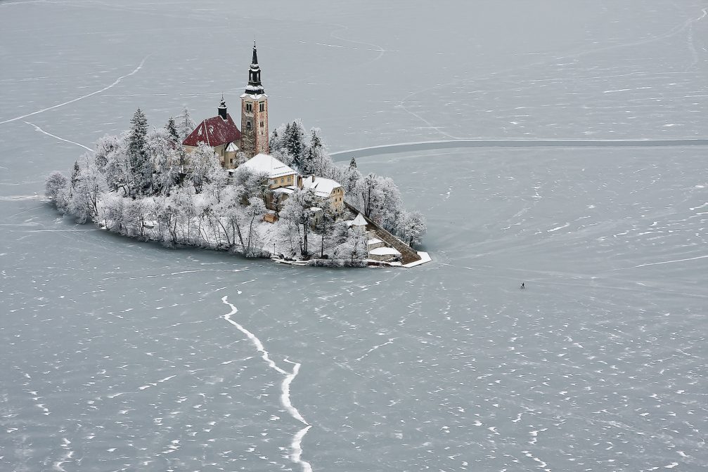 Bled Island in the middle of frozen Lake Bled 