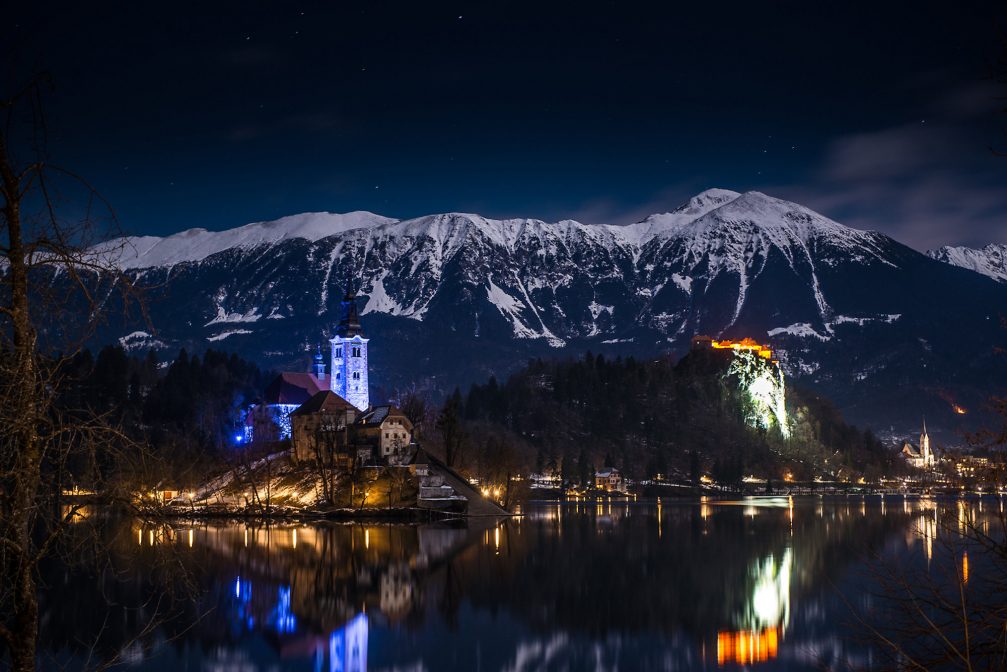 Lake Bled with Bled Island and Bled Castle lit up at night